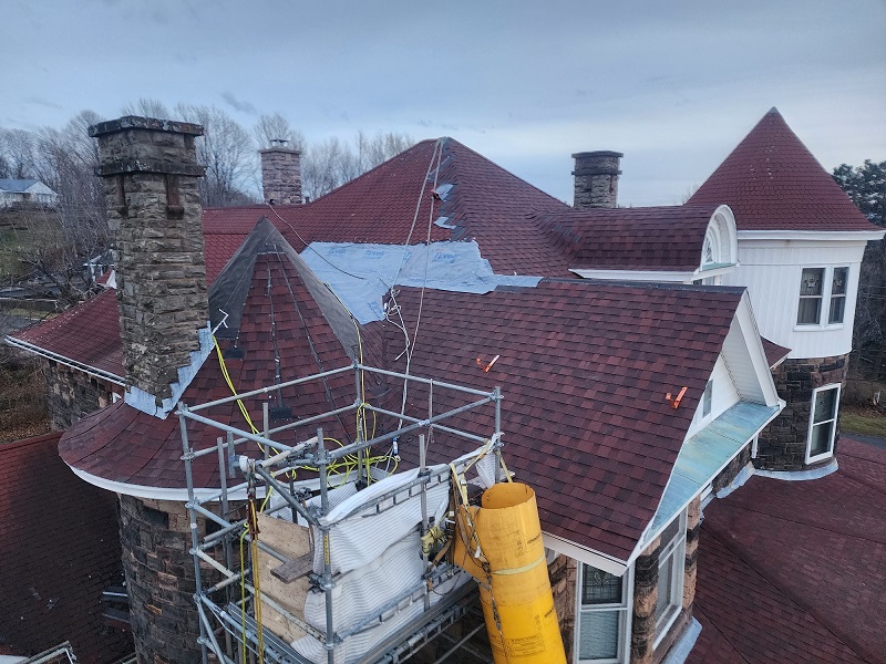 Example of a complex shingle roof on a funeral home